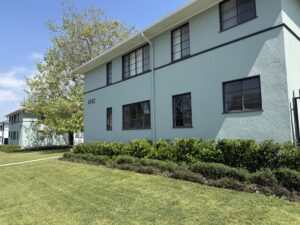 Exterior Acclaim at Baldwin Village, outdoor area, Meticulous landscaping along side of building.
