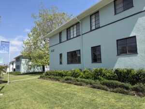Exterior Acclaim at Baldwin Village, outdoor area, Meticulous landscaping along side of building.
